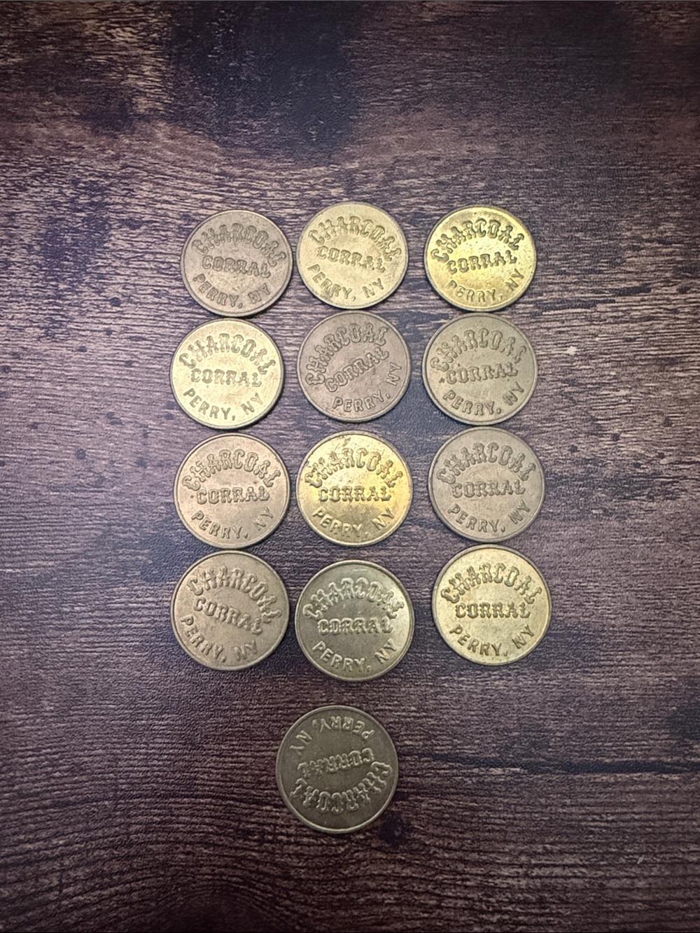 Corral Brass-Colored Token with Embossed Logo